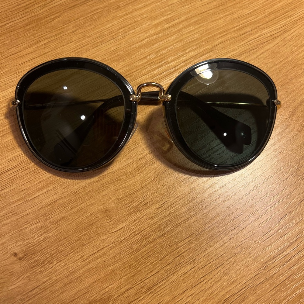 Miu Miu Round Blue Sunglasses